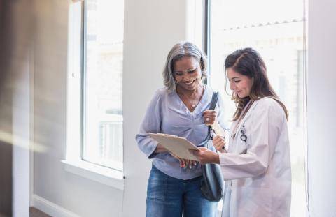 Doctor Showing Patient Chart