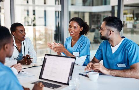 Nurses supporting and talking with each other