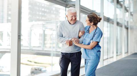 Nurse helping patient