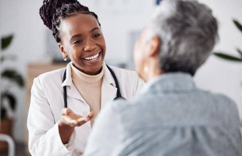 Doctor talking with patient